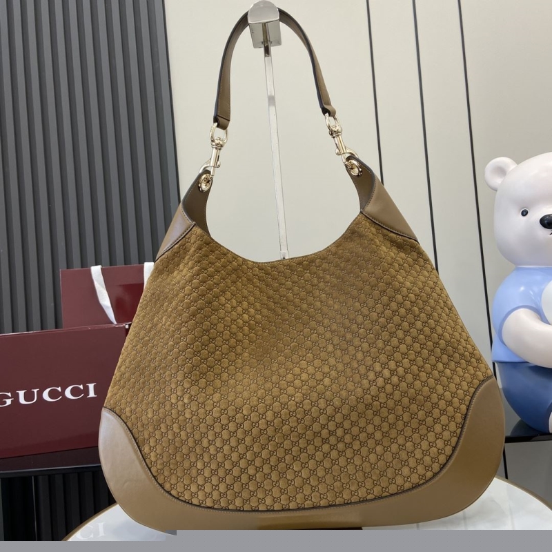 G*u*i top handle bags